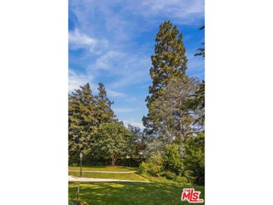 Located on one of the most desirable streets in all of Los - photo 9