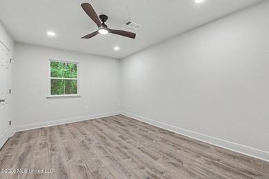 What a beautifully remodeled home on two lots with a metal - photo 21
