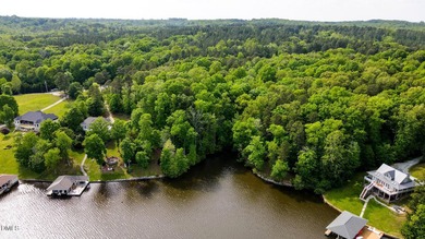 HYCO LAKE WATERFRONT LOT with amazing views! Current 2 bedroom - photo 1