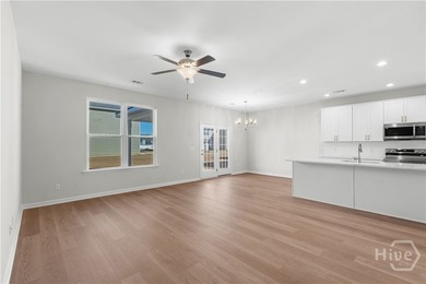 The Hatteras floorplan by Smith Family Homes is under - photo 4