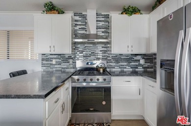 Refined, upgraded, and exceptionally cared for, this expansive - photo 27