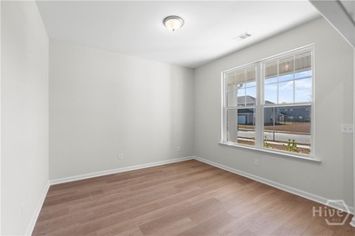 The Hatteras floorplan by Smith Family Homes is under - photo 7