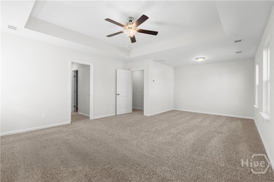 The Hatteras floorplan by Smith Family Homes is under - photo 9