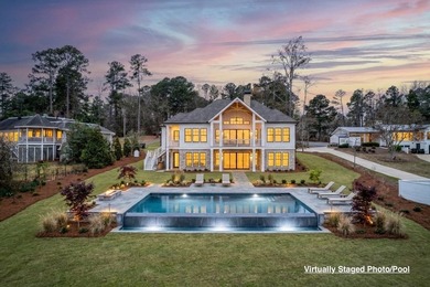 Experience the pinnacle of lakefront living in this stunning new - photo 3