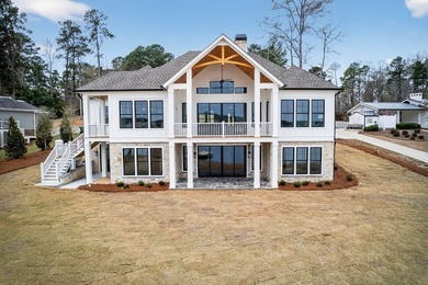 Experience the pinnacle of lakefront living in this stunning new - photo 4