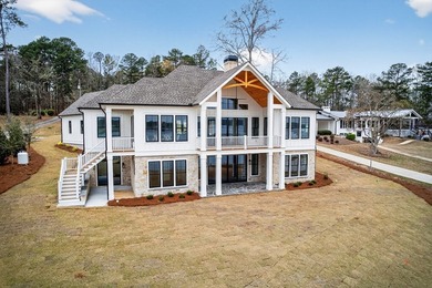 Experience the pinnacle of lakefront living in this stunning new - photo 6