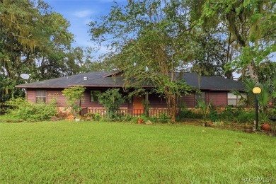 Nestled beneath a canopy of majestic oak trees and overlooking - photo 2