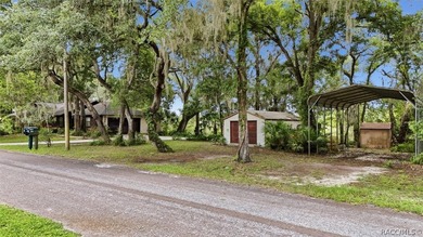 Nestled beneath a canopy of majestic oak trees and overlooking - photo 5
