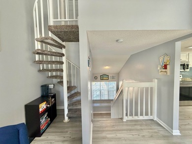 Updated townhome with new grey weathered-looking LVP flooring - photo 17