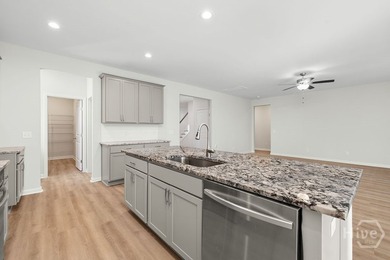 The Roswell plan by Smith Family Homes is under construction in - photo 10