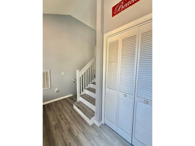 Updated townhome with new grey weathered-looking LVP flooring - photo 26