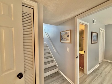 Updated townhome with new grey weathered-looking LVP flooring - photo 29