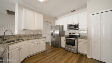 Welcome to this move-in ready townhome in Timmermans Walk! This - photo 4