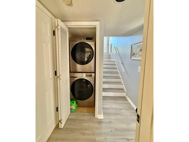 Updated townhome with new grey weathered-looking LVP flooring - photo 44