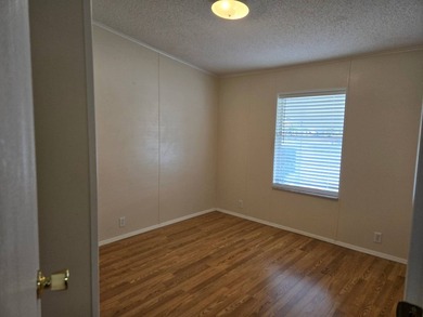 This beautiful 4-bedroom, 2-bath lakefront home sits on a - photo 18