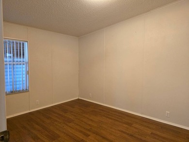 This beautiful 4-bedroom, 2-bath lakefront home sits on a - photo 21