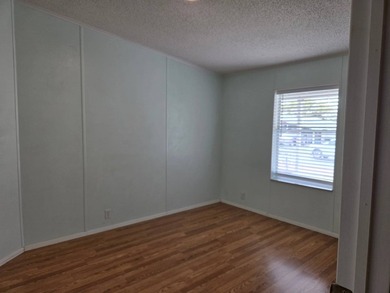 This beautiful 4-bedroom, 2-bath lakefront home sits on a - photo 25