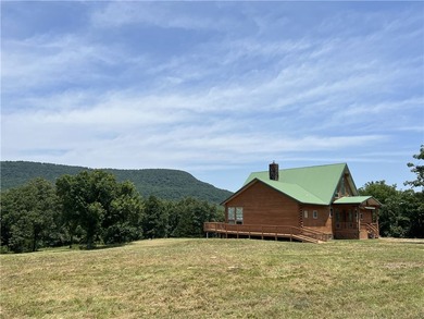 Beautiful views with this secluded log home on 207 acres m/l