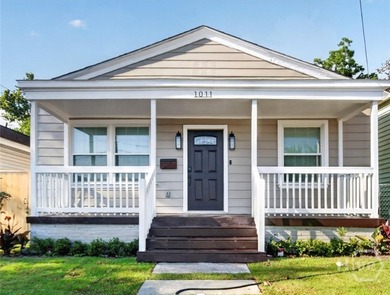 WELCOME HOME AND STEP INSIDE TO DISCOVER AN OPEN CONCEPT FLOOR - photo 1