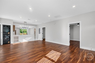WELCOME HOME AND STEP INSIDE TO DISCOVER AN OPEN CONCEPT FLOOR - photo 7