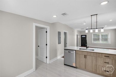WELCOME HOME AND STEP INSIDE TO DISCOVER AN OPEN CONCEPT FLOOR - photo 9