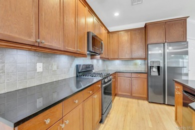 Tucked within the heart of vibrant Patchogue Village, this - photo 13