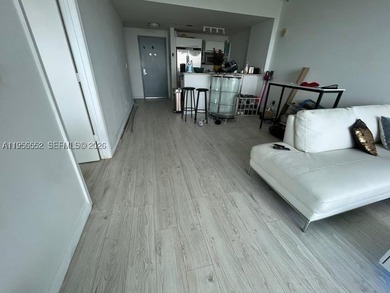 Experience modern luxury living at The Blue Condo. Wake up to - photo 3