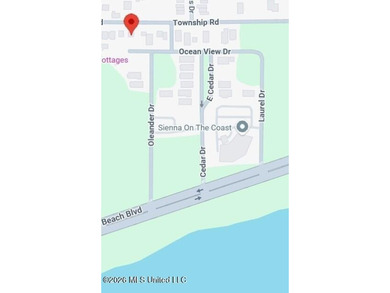 Check out this great lot just a short walk to the beach in - photo 2
