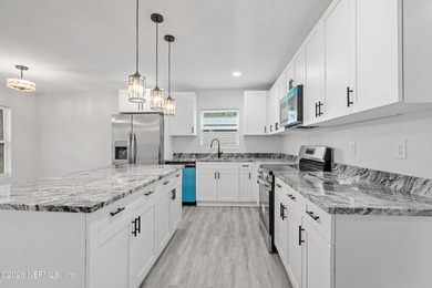 Beautiful new construction 4 bedroom, 2 bathroom home nestled on - photo 8