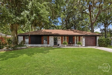 Tucked beneath mature trees on Wilmington Island, 607 Leaning - photo 1