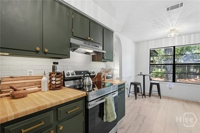 Tucked beneath mature trees on Wilmington Island, 607 Leaning - photo 7