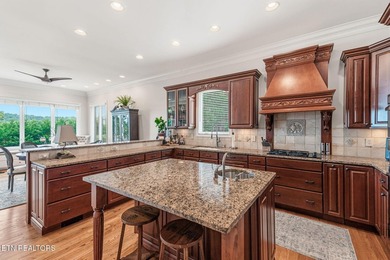 Enjoy peaceful lakefront living in this custom brick and stone - photo 32