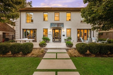 This iconic Lakewood residence masterfully blends historic charm