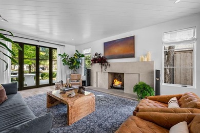 This iconic Lakewood residence masterfully blends historic charm