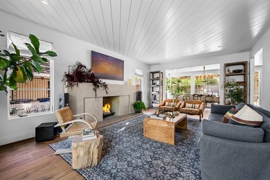 This iconic Lakewood residence masterfully blends historic charm