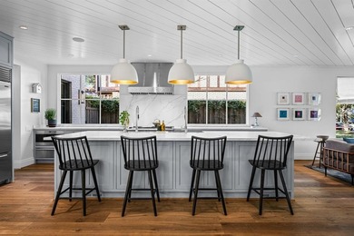 This iconic Lakewood residence masterfully blends historic charm