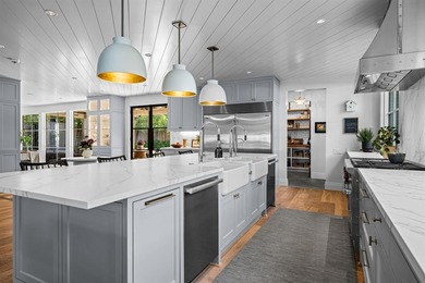 This iconic Lakewood residence masterfully blends historic charm