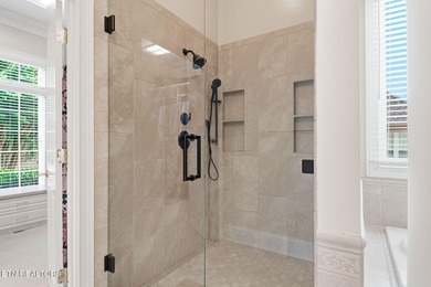 Enjoy peaceful lakefront living in this custom brick and stone - photo 41