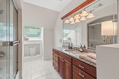 Enjoy peaceful lakefront living in this custom brick and stone - photo 44