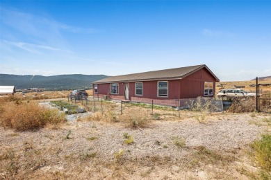 Lake Home For Sale in Elmo, Montana