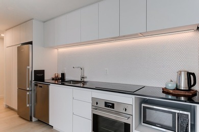Magnifique condo contemporain d'une chambre a coucher, situe au - photo 5