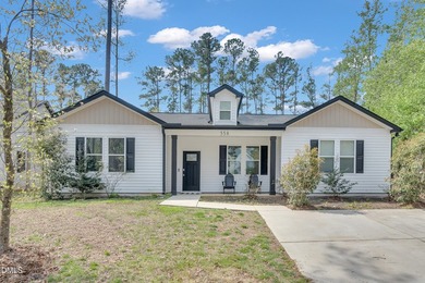 Welcome to Lake Royale living! This beautifully maintained - photo 2