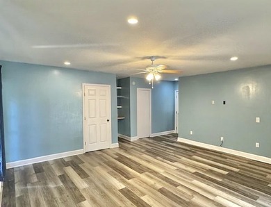 Beautifully updated 4BR/3.5BA coastal home on a prime .34-acre - photo 12
