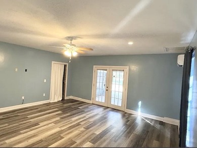 Beautifully updated 4BR/3.5BA coastal home on a prime .34-acre - photo 13