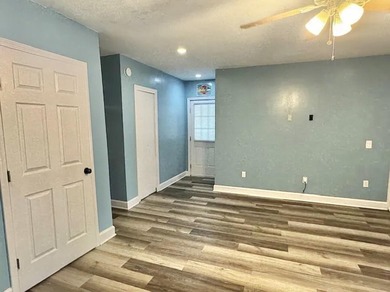 Beautifully updated 4BR/3.5BA coastal home on a prime .34-acre - photo 14