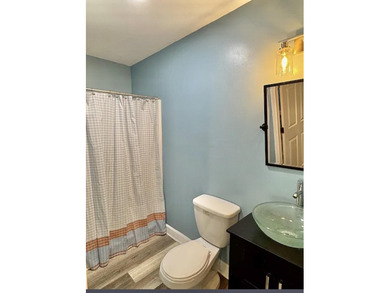 Beautifully updated 4BR/3.5BA coastal home on a prime .34-acre - photo 15