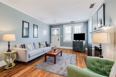 Built in 1923, this charming brick bungalow delivers the - photo 5