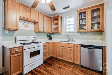 Built in 1923, this charming brick bungalow delivers the - photo 10