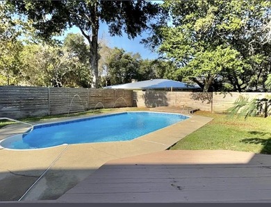Beautifully updated 4BR/3.5BA coastal home on a prime .34-acre - photo 25
