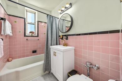 243 McDonald Ave, apartment 3F, sits at the rear corner of the